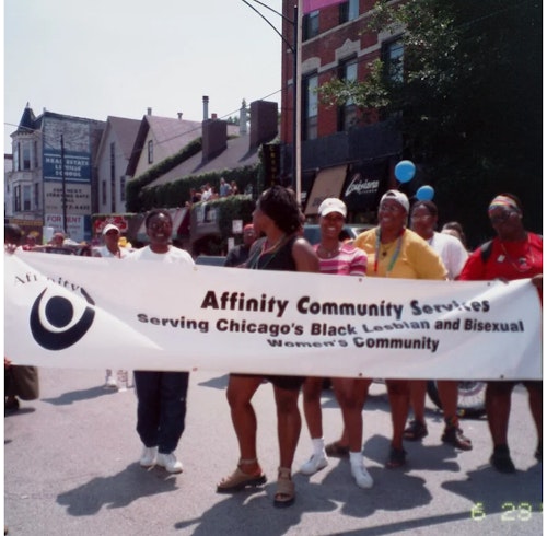 Affinity Community Alliance members walking in the Bud Billiken parade.