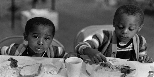 kids eating food at a table