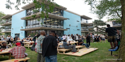 image of the exterior of Overton during an event with people