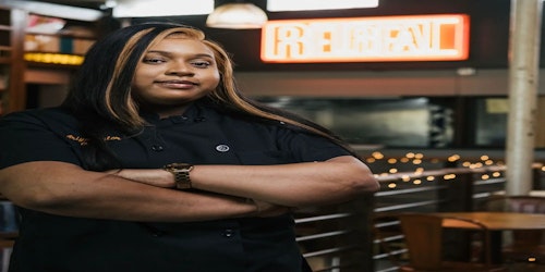 woman standing with hands crossed